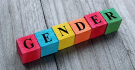 Das Foto zeigt sechs Würfel, auf denen Buchstaben zu sehen sind, die zusammen das Wort Gender ergeben. Das Foto ist von AdobeStock/chrupka.