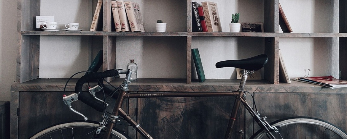 bike in front of a shelf - 