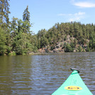 Canoe on the Regen with view of rocky riverbank