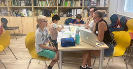 Pupils sit in the classroom.