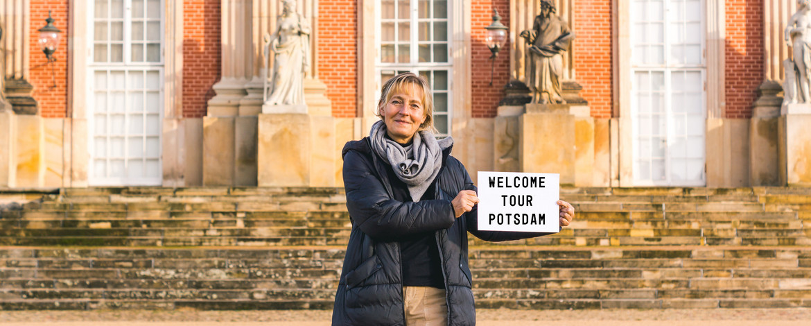 Welcome Center staff Carolin in front of the New Palace - 