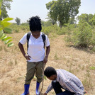 James and Eunice working together in the field