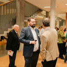 Guests in conversation at the reception that followed the ceremony.