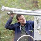 Prof. Dr. Sascha Oswald with a probe for measuring soil moisture, environmental sciences and hydrology.