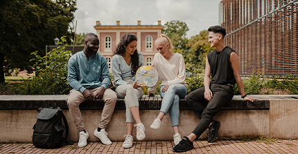 International Scholars chatting with each other